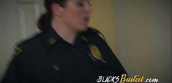  Big titty MILFs are banging hard with a big black dick suspect while on duty.